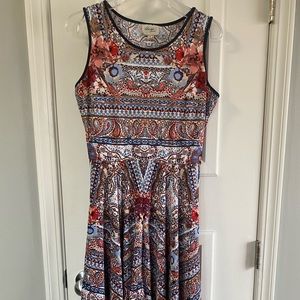 Unique, sleeveless, asymmetrical dress